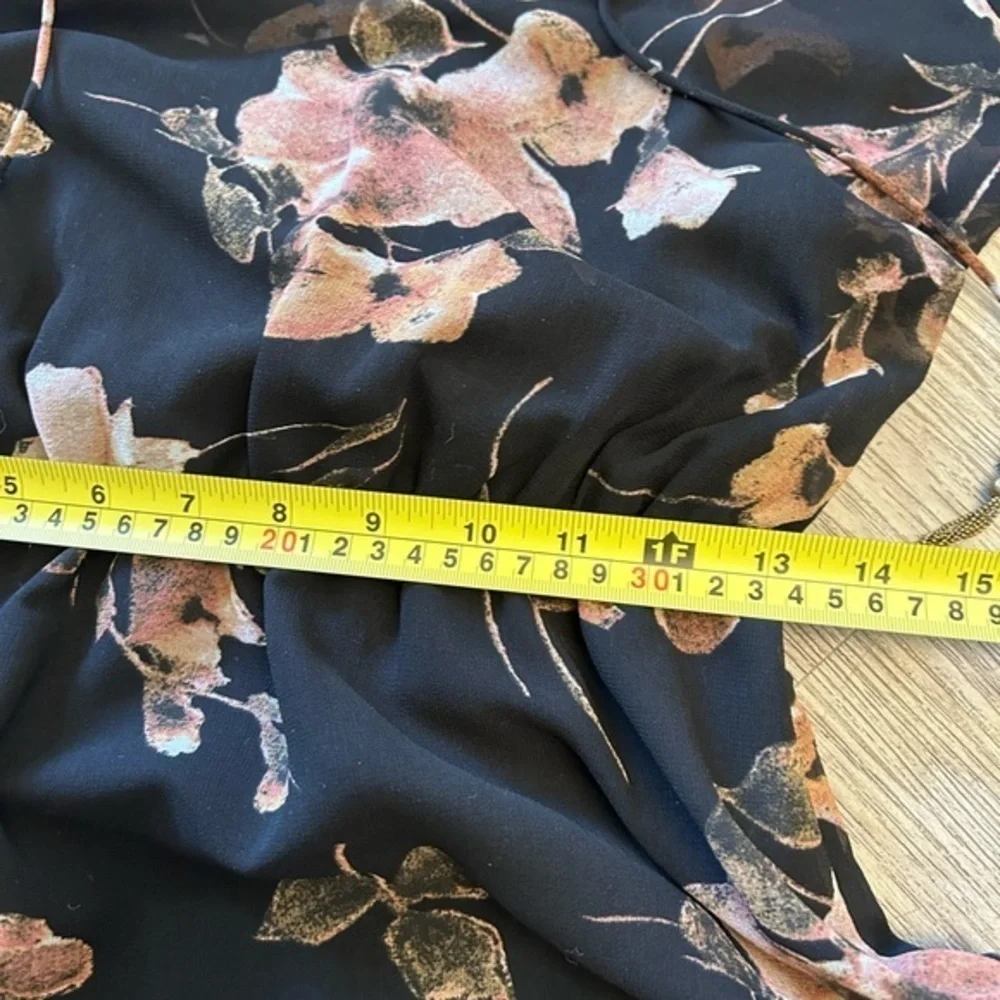Pretty floral dress. Sheer with tank liner. Tassel details. Elastic waistband. - Picture 13 of 13